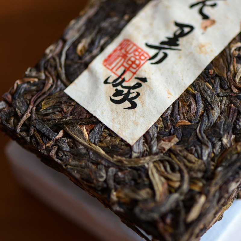 2022 Lao Man'E Ancient Tree Spring Tea Pure Material Raw Pu'er – 125g Brick | Sheng Pu'er - Image 4